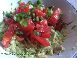 HCG Phase 3 Guacamole Recipe with tomatoes and jalapeños in bowl