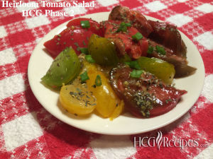 Heirloom Tomato Salad HCG Phase 2 Heirloom tomatoes, herbs on checkered tablecloth
