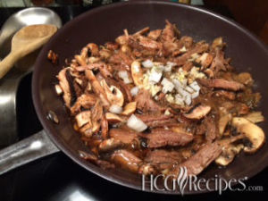 Low Carb P3 Recipe Pot Roast pie Recipe Beef and Mushrooms in pan with garlic and onions