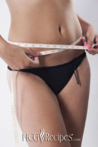 HCG Phase 2 Weight Loss Secrets Woman measuring waist.