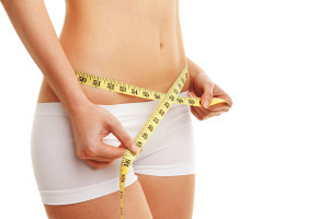 Before and After Measurements HCG Diet Woman with Measuring Tape